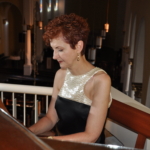 Valerie L Hall playing organ in church