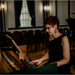 Valerie L Hall playing harpsichord Government House